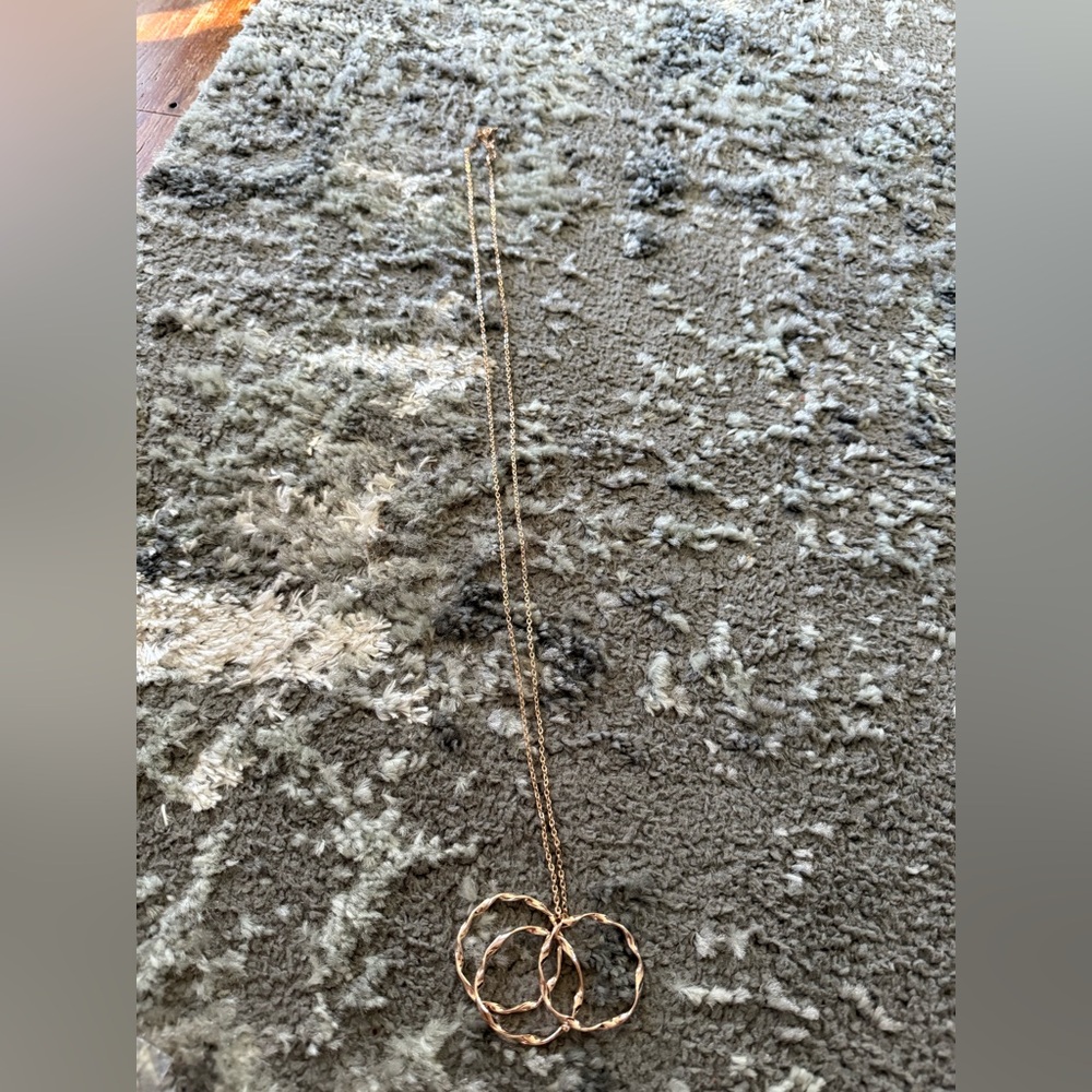 Long gold necklace